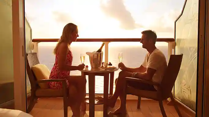 enjoying champagne on the balcony